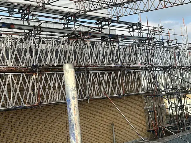 Industrial scaffolding installation showing heavy-duty scaffolding in an industrial setting